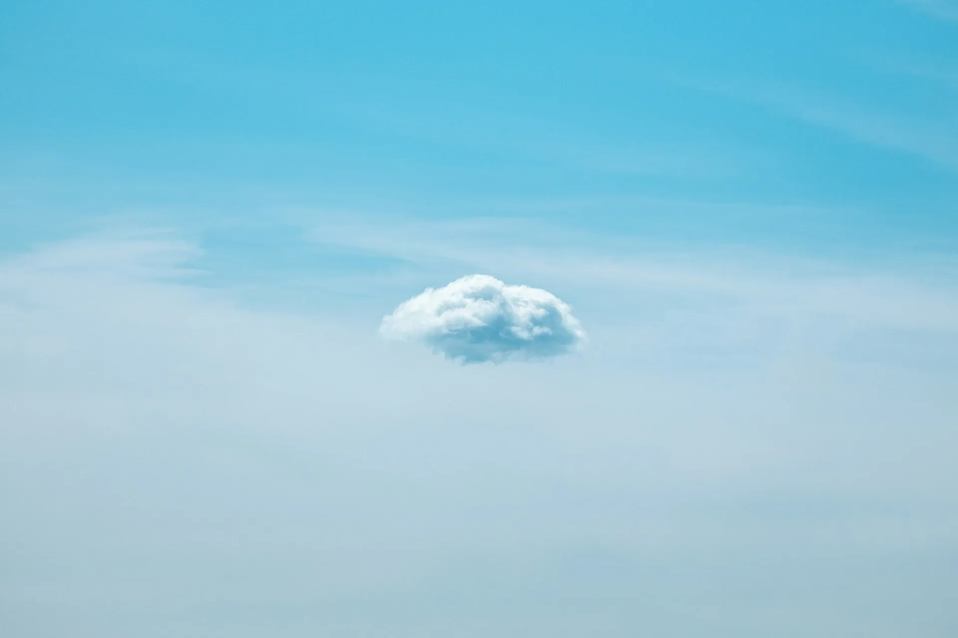 A single cloud by Parrish Freeman on Unsplash